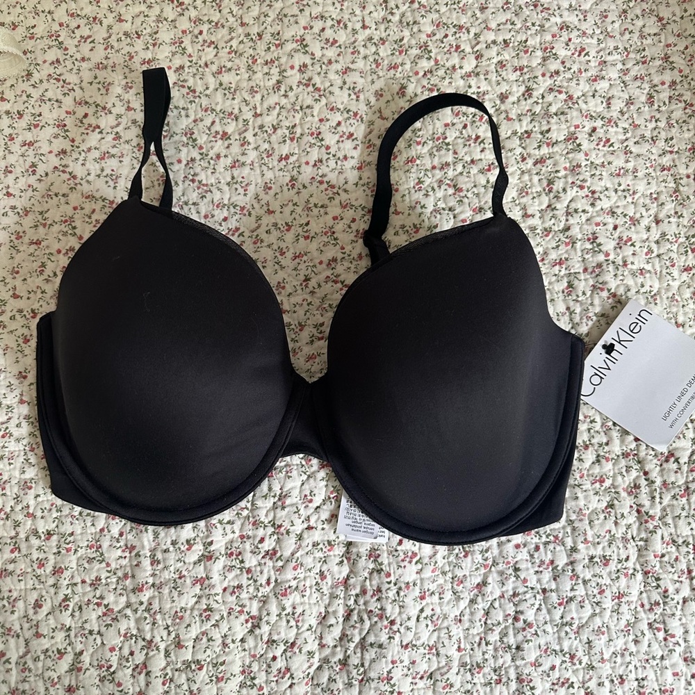 Calvin Klein Convertible Strap Lightly Lined Demi Bra in black 
Size 36DD NWT